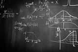 Black and white chalk board with formulas