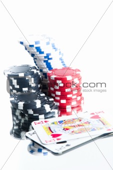 A pair of kings and some tokens over isolated white background