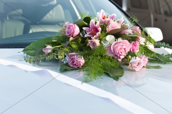 Wedding flowers on car