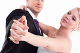 Holding hand groom and bride enjoying dancing