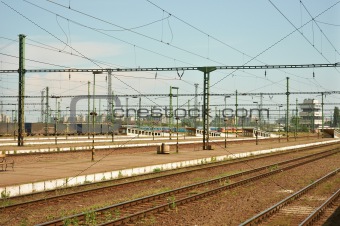 Old train station with rails and cables