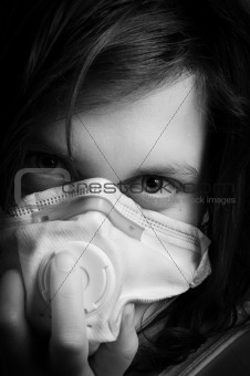 Girl wearing protective mask in black and white