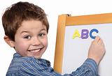 young boy learing the ABC