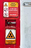 Closed door of a nuclear facility with signs