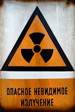 Russian Beware of radiation sign in metal