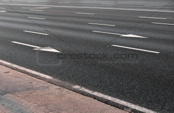 Arrow direction on asphalt