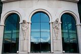 Modern windows with statues