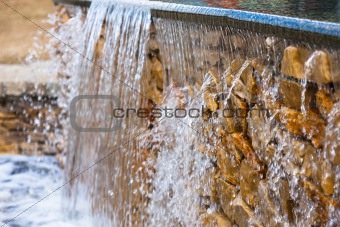 Artificial waterfall with blurry background