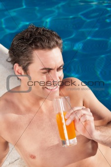 Handsome man by the poolside