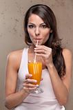 Woman drinking orange juice