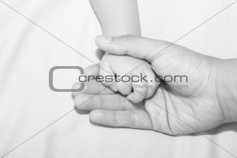 Father holding daughters hand