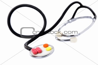 medical concept with colorful pills and stethoscope