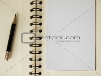 White note paper and black pencil