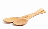 Two wooden spoons on white