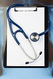 Note pad and stethoscope