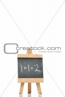 Chalkboard with an addition and a result written on it