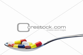 Spoon full of pills