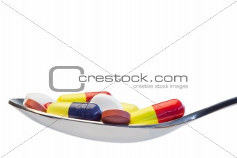 Spoon full of color pills