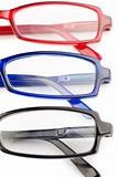 Spectacles with blue frames black frames and red frames