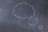 Empty cloud bubbles on a blackboard