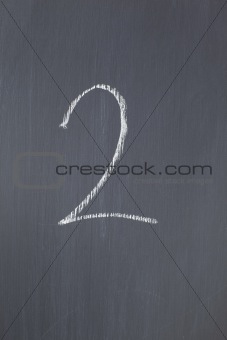 Blackboard with "2" written on it
