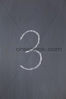 Blackboard with "3" written on it