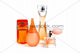 Orange perfume bottles isolated