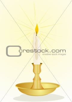 Burning candle in a candlestick