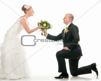 wedding couple are holding bridal bouquet
