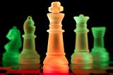 red and green glass chess pieces