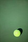 Tennis ball on court, concept photography