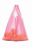 Plastic bag of oranges