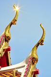 detail of ornately decorated temple roof in bangkok