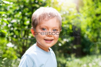 Boy in the summer park