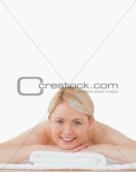 Young beautiful blonde woman posing in a spa centre