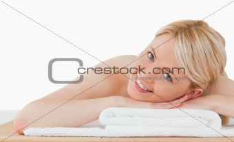 Young good looking blonde woman posing in a spa centre