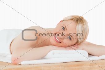 Young pretty blonde woman posing in a spa centre