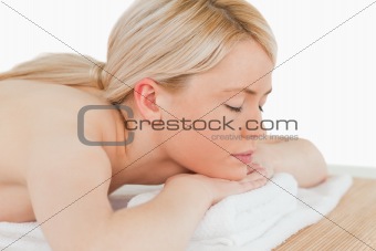 Young pretty blonde female relaxing in a spa centre