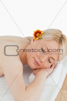 Young lovely female relaxing in a spa centre
