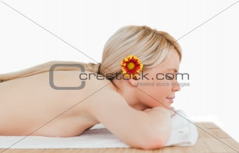 Young cute female relaxing in a spa centre