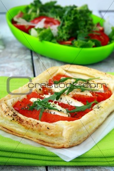 tart of puff pastry with peppers and goat cheese 