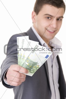 Young Businessman Offering Money