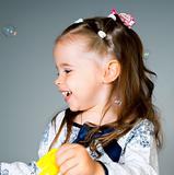 little girl with bubbles