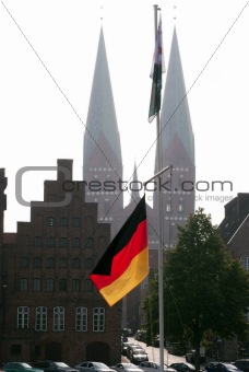 German flag and church towers