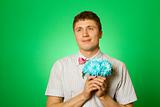 Parody lover man "nerd" with a bouquet of flowers