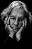 Black and white depressed senior woman