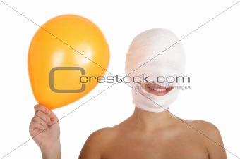 woman with bandaged head