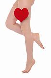 female legs with red heart