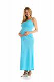 happy pregnant woman in blue dress