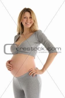 happy pregnant woman in gray suit